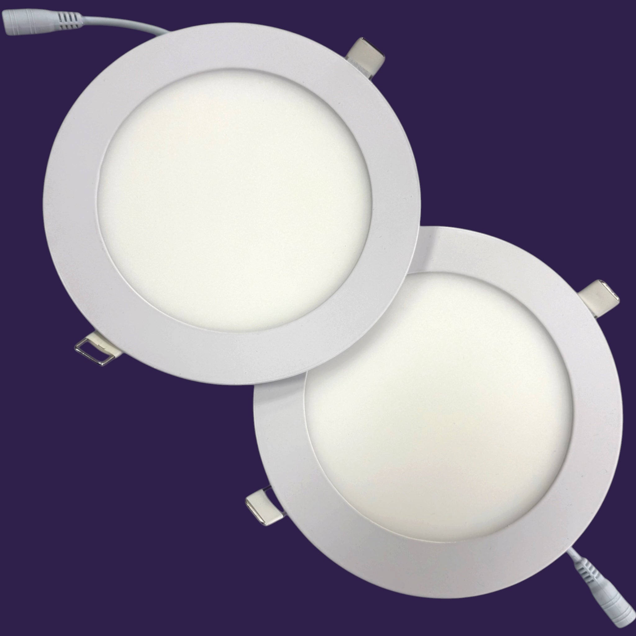 Twin Pack of 11W Round LED Recessed Downlights with spring clips on purple background