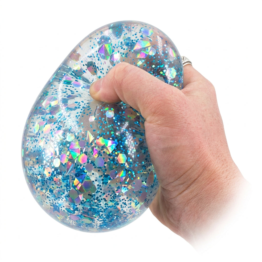 Squeezing a glitter gel ice cube squishy sensory toy