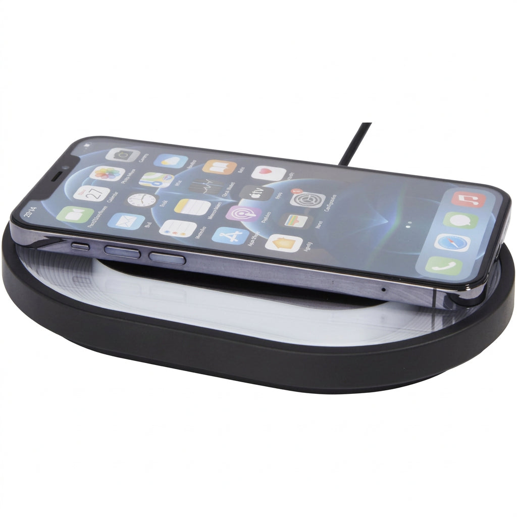 Wireless 15W Fast Charging Pad charging smartphone on studio white background
