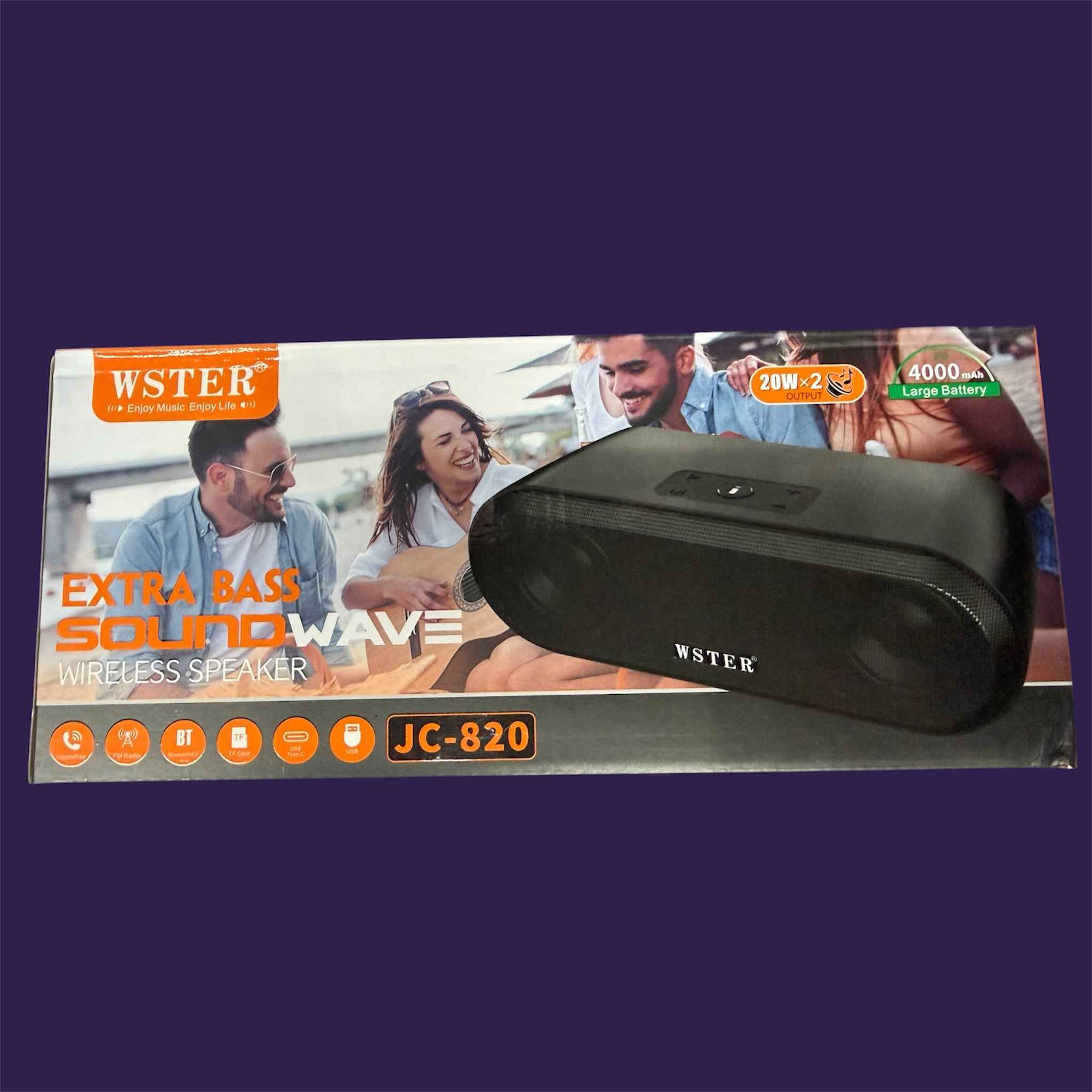 WSTER JC-820 wireless speaker with its retail packaging box featuring beach lifestyle graphic