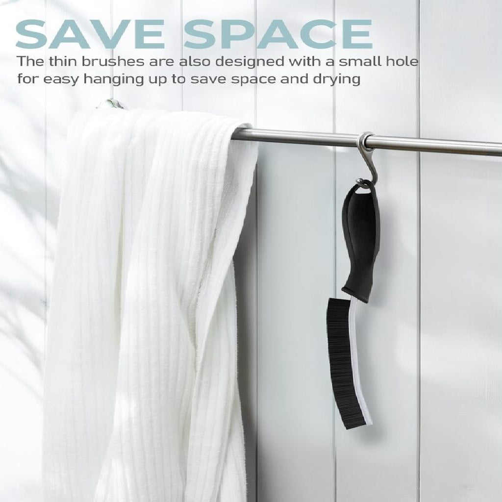 Hanging hard-bristle crevice cleaning brush stored on rail hook