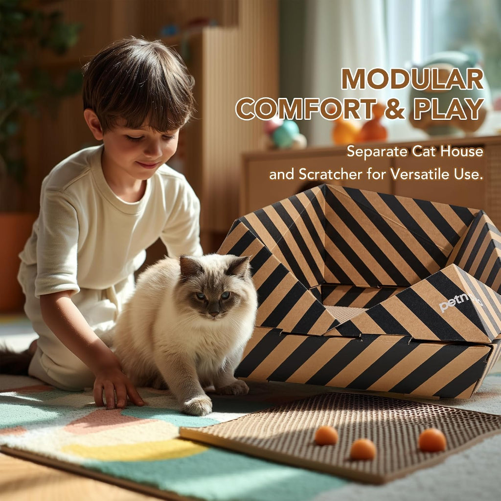A child sits on the floor beside a cat and a striped modular play house, with a scratching mat and small orange toys in a sunlit room. Text on the image reads 'MODULAR COMFORT & PLAY' and 'Separate Cat House and Scratcher for Versatile Use.