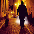 Warm LED lighted beanie cap worn during nighttime dog walking