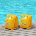 Pair of Bestway Swim Safe yellow floaties on poolside patio deck