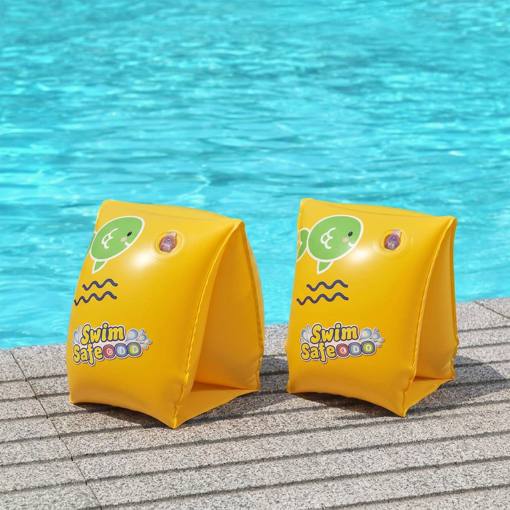 Pair of Bestway Swim Safe yellow floaties on poolside patio deck