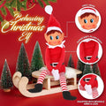 Vinyl face Naughty Elf Girl 12 inch plush doll seated on miniature wooden sleigh