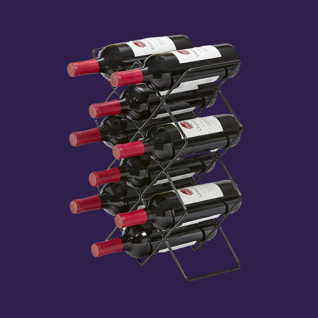 Black metal countertop wine rack holding wine bottles in diagonal slots
