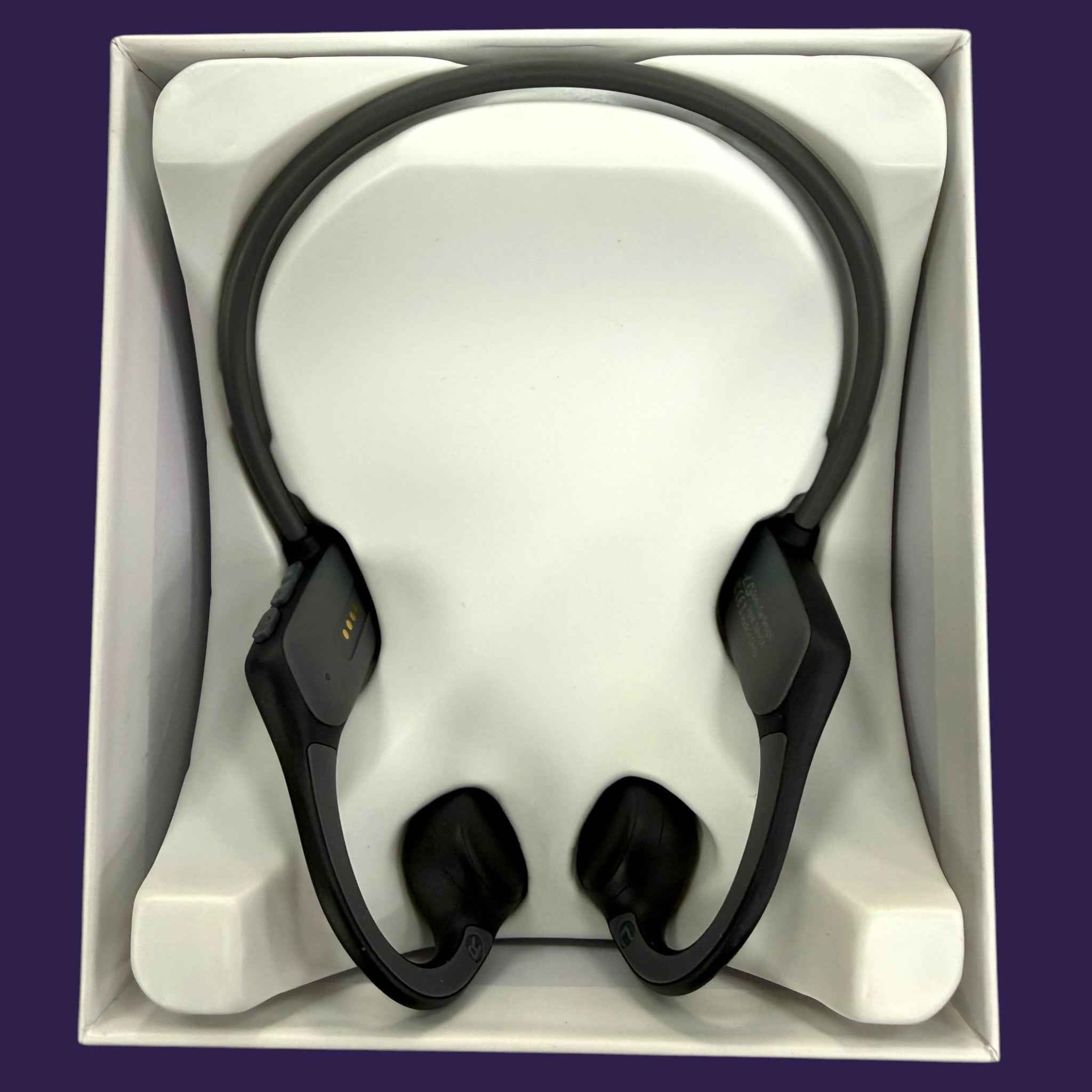 Ifecco Bone X5 waterproof headphones secured in its minimalist inner retail box
