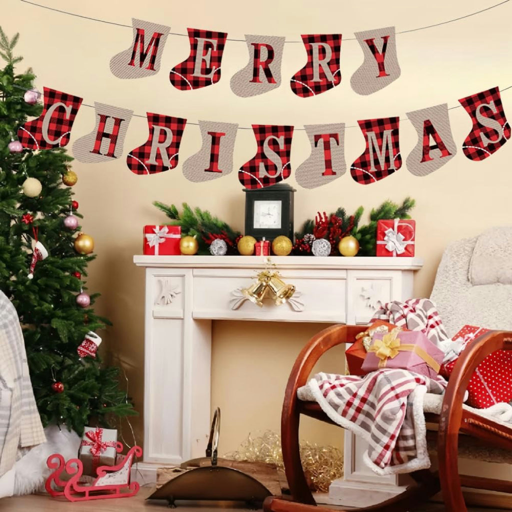 Merry Christmas burlap banner hanging on decorated fireplace mantel