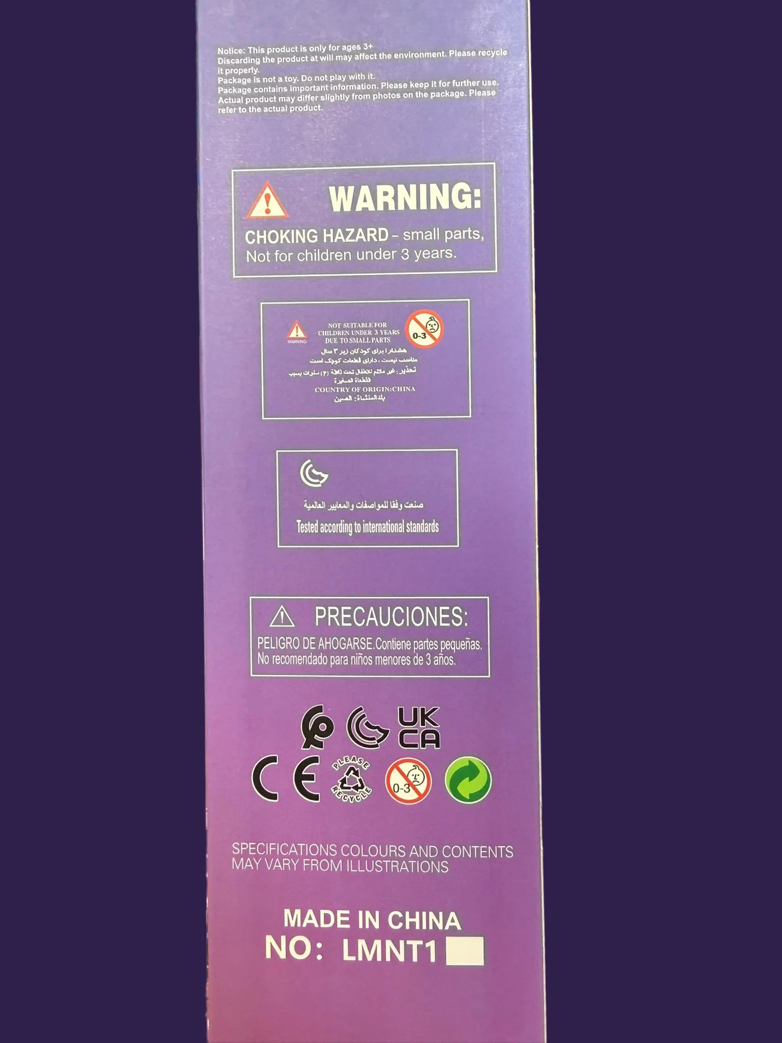Purple box with warning labels held by a hand in a store setting