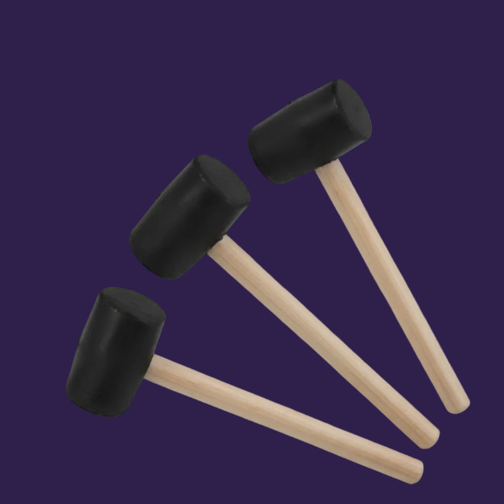 Marko Rubber Mallet Hammer with Wood Handle product shot against purple background