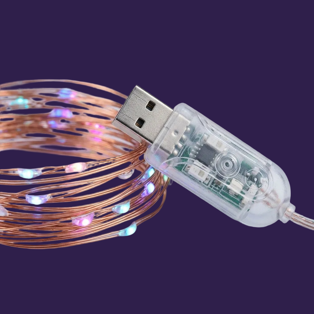 Detail close-up of the flexible copper wire and USB controller unit of the LED string lights