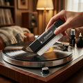 Action shot of the Kulloomii record cleaning brush on a vinyl record