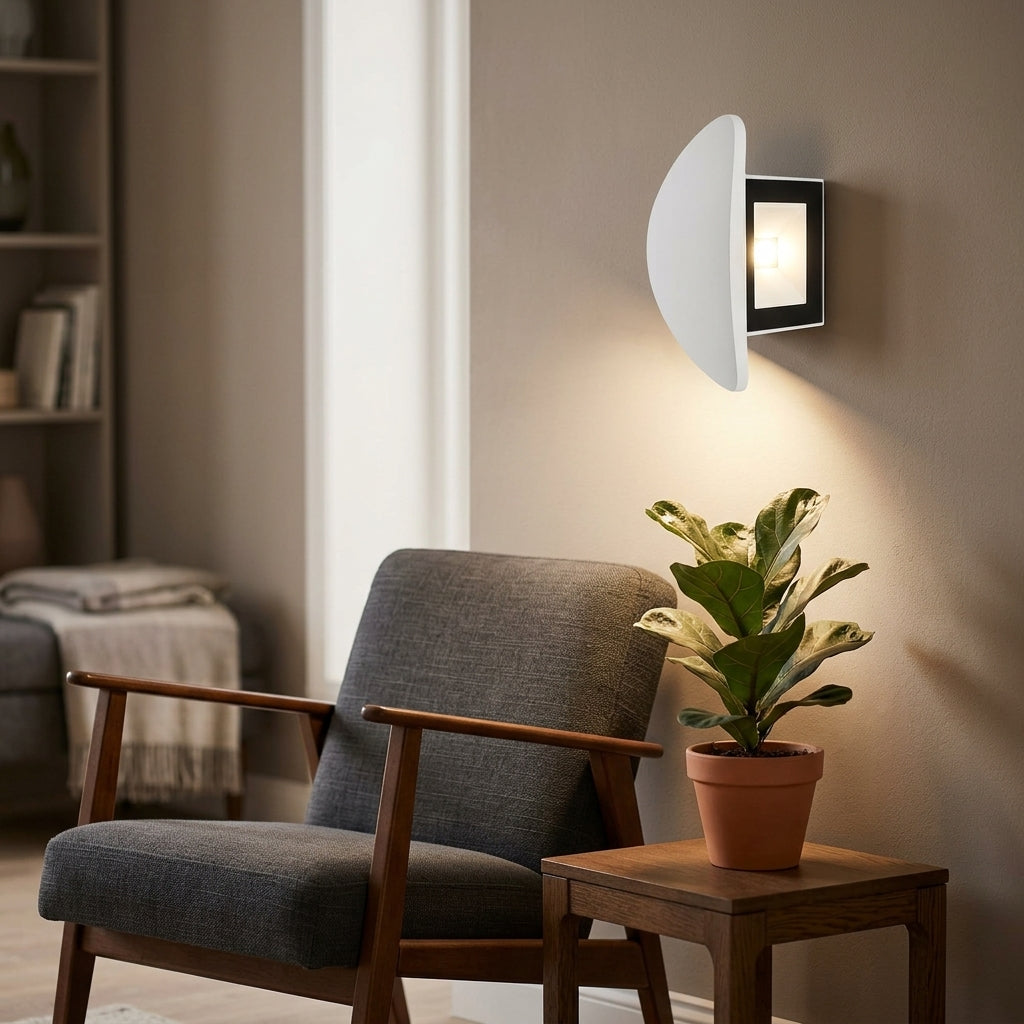 Lifestyle photo of curved LED wall light in cozy living room