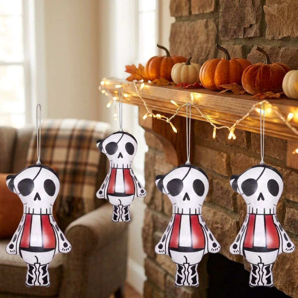 Pirate skull skeleton ornaments hanging on Halloween mantelpiece