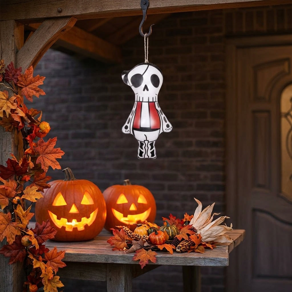 Hanging pirate skull skeleton ornament on Halloween porch display