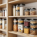 Organized kitchen pantry shelves featuring stackable clear food storage containers