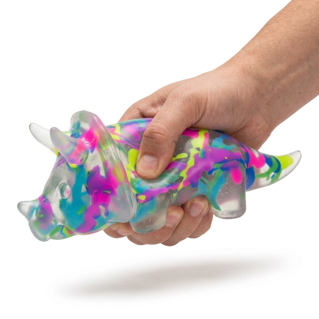 Hand squeezing KTL Triceratops graffiti squishy stress toy